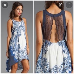 Free people dress, size large. Gorgeous lace back and high-low hemline.